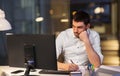 Businessman with computer working at night office Royalty Free Stock Photo