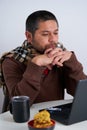 Businessman Concentrated on Laptop Task