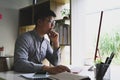 Businessman concentrated working on computer.