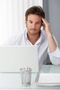 Businessman concentrating on computer work Royalty Free Stock Photo