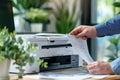 Businessman in Corporate Office Using Multifunction Laser Printer to Print Important Documents Concept Highlighting Ink Royalty Free Stock Photo