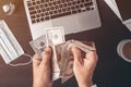 Businessman counting american dollar paper currency cash at office desk Royalty Free Stock Photo