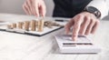 Businessman counting coins and using calculator. Business. Finance Royalty Free Stock Photo