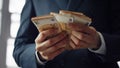 Businessman counting euro bills close up. Man hands holding european currency. Royalty Free Stock Photo