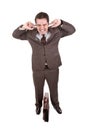 Businessman covering his ears Royalty Free Stock Photo