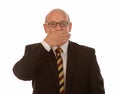 Businessman covering mouth