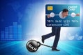 Businessman in credit card burden concept in pillory