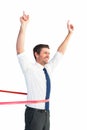 Businessman crossing the finish line Royalty Free Stock Photo