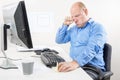 Businessman crying and whining at the office Royalty Free Stock Photo