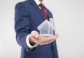 Businessman with crystal house in hand Royalty Free Stock Photo