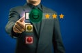 Businessman or customer give rating to service experience on virtual touch screen and finger pressing smiley face emoticon Royalty Free Stock Photo