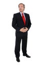 Businessman in dark suit and red tie
