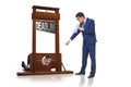 Businessman in deadline concept with guillotine