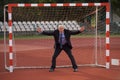 Businessman defending goal