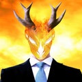 Businessman with devil mask on the background of business people and fire. Royalty Free Stock Photo