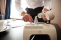 Businessman dialing a telephone number in order to make a phone call. Royalty Free Stock Photo