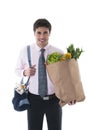 Businessman with diaper bag and shopping bag Royalty Free Stock Photo