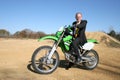 Businessman on Dirt Bike Royalty Free Stock Photo