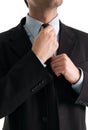 Businessman doing his tie Royalty Free Stock Photo