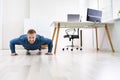 Businessman Doing Push Up