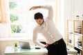 Businessman doing stretching exercise Royalty Free Stock Photo