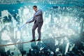 The businessman doing tightrope walking in risk concept Royalty Free Stock Photo