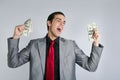 Businessman with dollar notes suit and tie Royalty Free Stock Photo