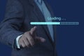 Businessman downloading digital business data form website and cloud. Download application and waiting to loading. loading bar