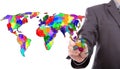 Businessman drawing colorful map of world