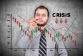 Businessman drawing crisis chart