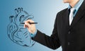 Businessman drawing heart diagram Royalty Free Stock Photo
