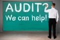 Businessman Drawing Question Mark By Audit Text On Chalkboard Royalty Free Stock Photo