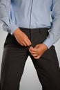 Businessman Dressing, Pulling His Pants Zipper Royalty Free Stock Photo