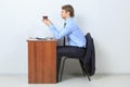 Businessman drink coffee or tea hold cup sitting