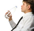 The businessman drinking water from a bottle Royalty Free Stock Photo