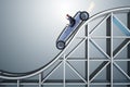 The businessman driving sports car on roller coaster