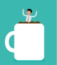 Businessman drowning drowning in a Cup of coffee