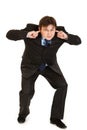 Businessman ducking in fear and closing ears Royalty Free Stock Photo