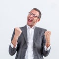 Businessman with dynamic body language screaming victory Royalty Free Stock Photo