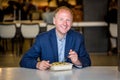 Businessman eating lunch Royalty Free Stock Photo