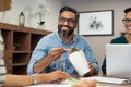 Businessman eating noodles during lunch break Royalty Free Stock Photo