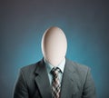 Businessman with egg istead of head Royalty Free Stock Photo