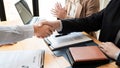 Businessman employee candidate shaking hands with company leader HR manager or boss in office after successful negotiation, Royalty Free Stock Photo