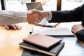 Businessman employee candidate shaking hands with company leader HR manager or boss in office after successful negotiation, Royalty Free Stock Photo