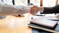 Businessman employee candidate shaking hands with company leader HR manager or boss in office after successful negotiation, Royalty Free Stock Photo