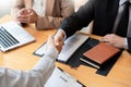 Businessman employee candidate shaking hands with company leader HR manager or boss in office after successful negotiation, Royalty Free Stock Photo