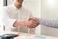 Businessman employee candidate shaking hands with company leader HR manager or boss in office after successful negotiation, Royalty Free Stock Photo