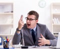 Businessman employee talking on the office phone Royalty Free Stock Photo