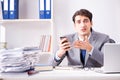 The businessman employee talking on the office phone Royalty Free Stock Photo