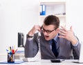 Businessman employee talking on the office phone Royalty Free Stock Photo